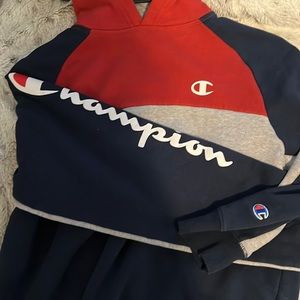 (L) Red, Blue, Grey, and White Champion Hoodie.